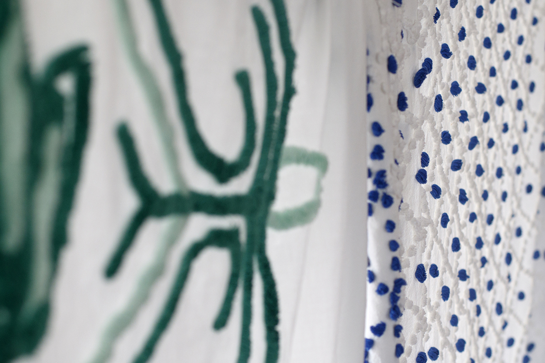 Staff photo by C.B. Schmelter /
Tufted bedspreads are seen on display in the Bandy Heritage Center for Northwest Georgia's Sandra Mahs exhibit at the Dalton Freight Depot on Wednesday, Aug. 15, 2018 in Dalton, Ga. The display represents one woman's search to find as many hand-tufted (and some machine-tufted) chenille bedspreads as she could find. Tufting was a cottage industry in the early 1900s that eventually led to Dalton's dominance in carpets and textiles. Sandra Mahs lives in Illinois, but some of her people were involved in the early days of tufting. Over about 20 years, she made it her mission to find as many spreads as she could to show the ingenuity and craftsmanship of Northwest Georgia residents. She recently donated most of her collection to the Bandy Center.