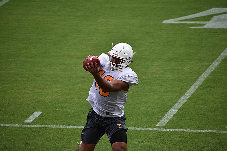 Tennessee tight end Dominick Wood-Anderson catches a pass as part of a drill during Tennessee's open practice at Neyland Stadium on Aug. 5, 2018.
