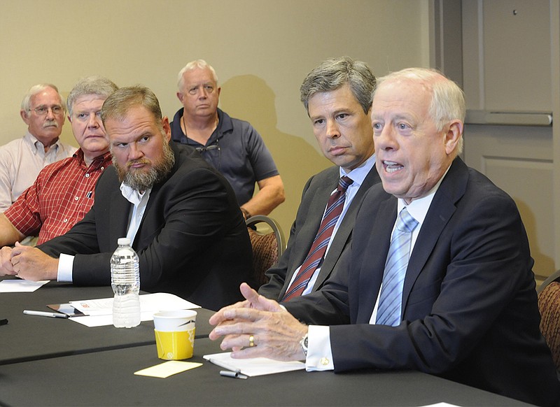 
Former Tennessee Governor, and U.S. Senate candidate, Phil Bredesen, right, speaks during a roundtable discussion with Sequatchie Valley leaders about broadband access. The group met at the Hampton Inn in Kimball. Chattanooga Mayor Andy Berke sits next to Bredesen. Other Marion County officials, from left are, Roy Brackett, General Sessions Judge Mark Raines, Director of Schools Mark Griffith and Marion County Sheriff Bo Burnett listen in. / Staff photo by Tim Barber