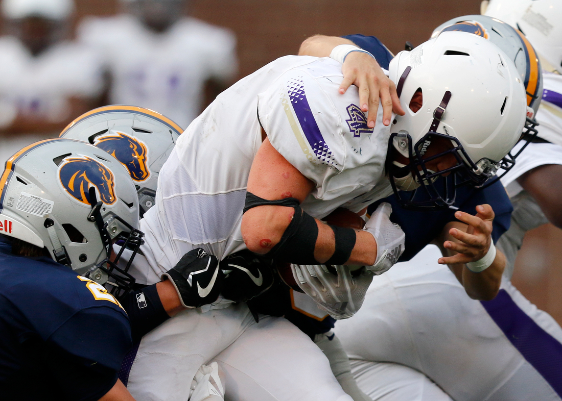 Staff photo by C.B. Schmelter /
Central's Hunter Jones (4) fights for yards against Walker Valley during the first game of the Chattanooga Kickoff Classic at Finley Stadium on Thursday, Aug. 16, 2018 in Chattanooga, Tenn.