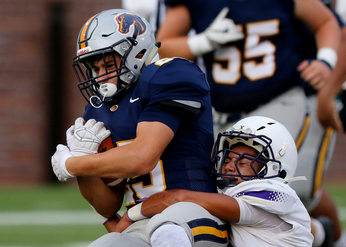 Staff photo by C.B. Schmelter /
Walker Valley's Heath Tanksley (25) is tackled by Central's Jay Jones (8) during the first game of the Chattanooga Kickoff Classic at Finley Stadium on Thursday, Aug. 16, 2018 in Chattanooga, Tenn.