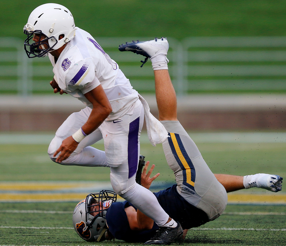 Staff photo by C.B. Schmelter /
Central's Jay Jones (8) breaks out of a tackle attempt from Walker Valley's Kole Hall (3) for a touchdown during the first game of the Chattanooga Kickoff Classic at Finley Stadium on Thursday, Aug. 16, 2018 in Chattanooga, Tenn.