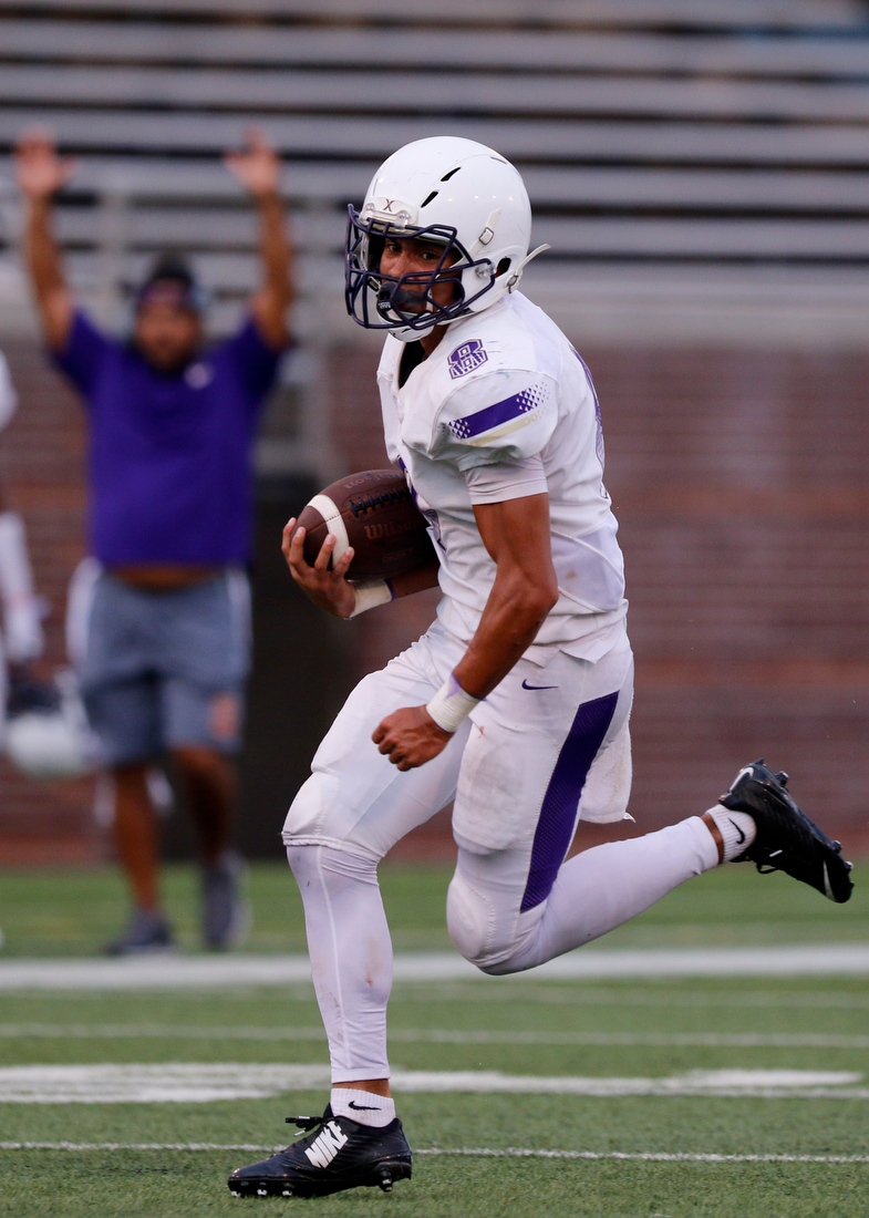 Staff photo by C.B. Schmelter /
Central's Michael McGhee (16) carries the ball versus Walker Valley during the first game of the Chattanooga Kickoff Classic at Finley Stadium on Thursday, Aug. 16, 2018 in Chattanooga, Tenn.
