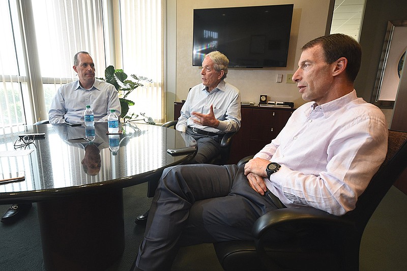 In this 2018 staff file photo, Michael, Charles and Stephen Lebovitz, from left, celebrate 40 years as a company as they talk about CBL Properties.