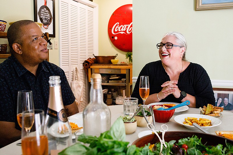 Todd Richards and Virginia Willis chat at Willis' home in Atlanta, July 24, 2018. The two Southern cooks discuss the origins and complexities of soul food and Southern food. (Dustin Chambers/The New York Times)