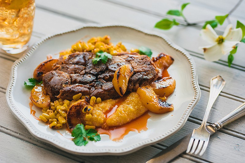 Griddled Peaches & Pork is a dinner entree available at Tupelo Honey after 4 p.m. Sundays through Wednesdays. (Tupelo Honey photo)