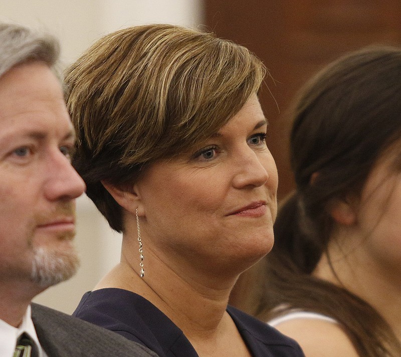 Staff photo by Doug Strickland / 
Alicia Vaughn sits with her family during a Catoosa County Commission meeting at the Catoosa County administrative building on Tuesday, Aug. 21, 2018, in Ringgold, Ga. Commissioners voted unanimously to donate about 5 acres of land to the Catoosa County Board of Education.