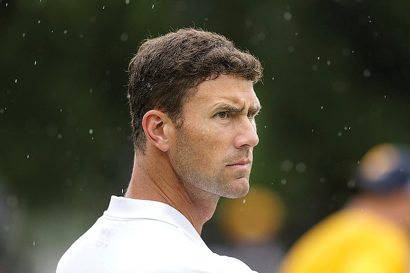 UTC head football coach Tom Arth watches players at Scrappy Moore Field in Chattanooga. (Staff photo by Doug Strickland)