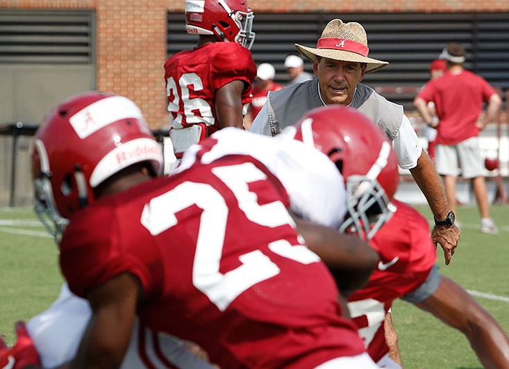 
Alabama football coach Nick Saban, photographed Aug. 4, was asked after Thursday's practice about the suspension of Ohio State counterpart Urban Meyer. / AP