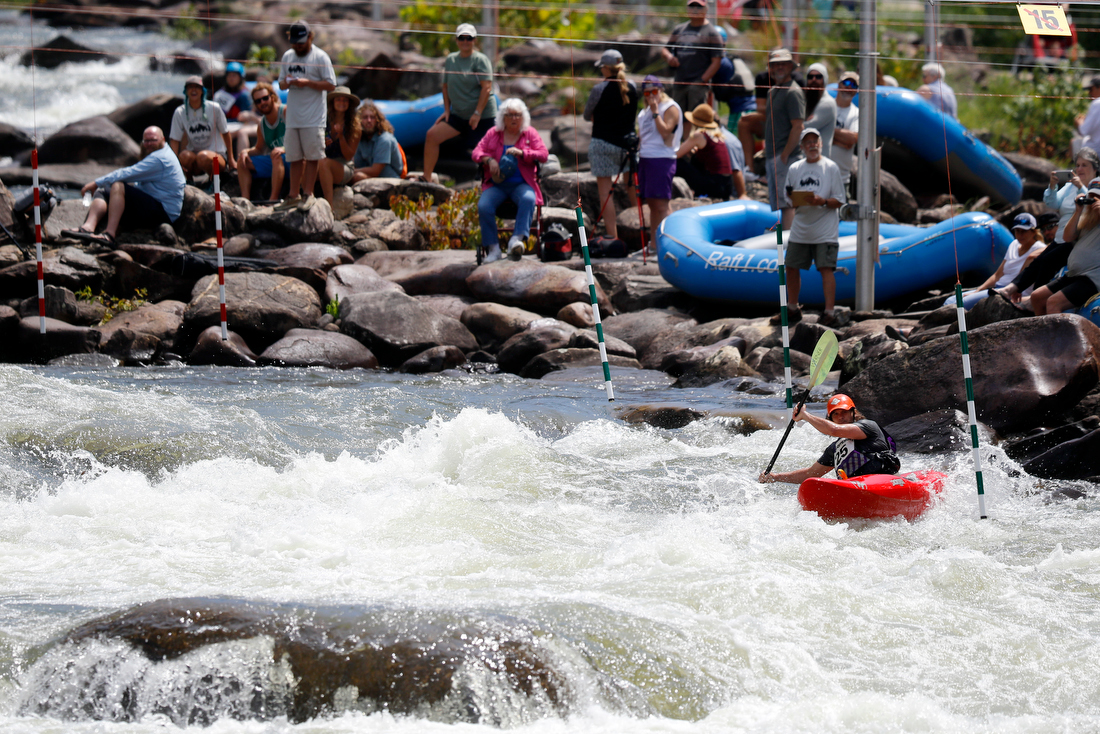 Staff photo by C.B. Schmelter /
Spectators watch as Mark Armistead competes in the slalom during the Ocoee River Championships on the 1996 Olympic Section of the Ocoee River on Friday, Aug. 24, 2018 in Copperhill, Tenn.