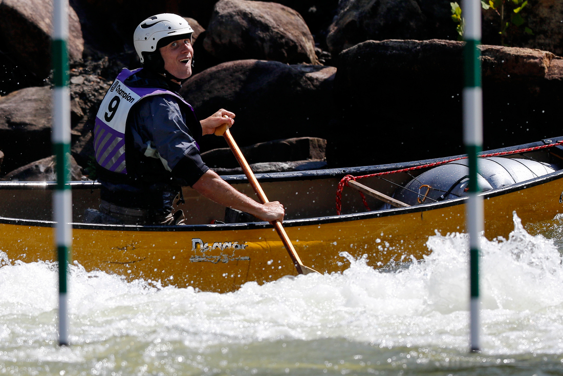 Staff photo by C.B. Schmelter /
Lucien Scott reacts as he navigates the slalom course during the Ocoee River Championships on the 1996 Olympic Section of the Ocoee River on Friday, Aug. 24, 2018 in Copperhill, Tenn.