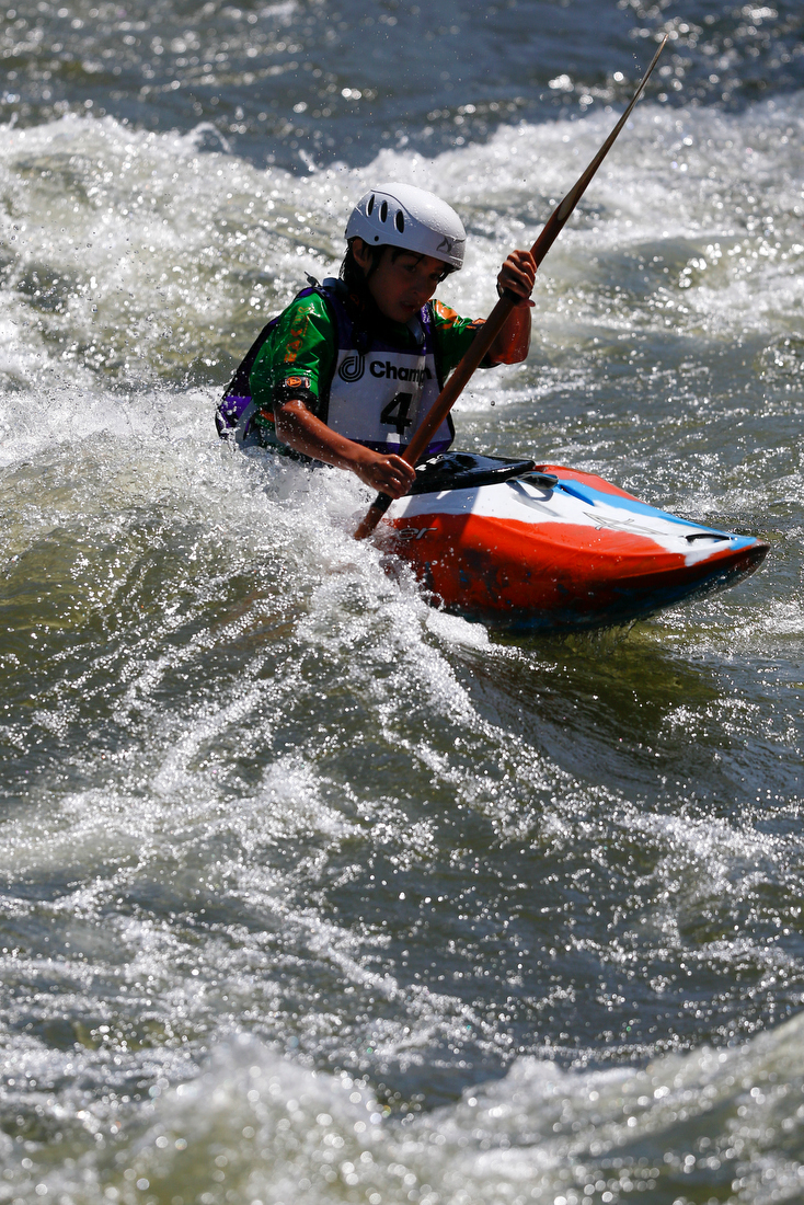 Staff photo by C.B. Schmelter /
Malcolm Smith nears the end of his run on the slalom course during the Ocoee River Championships on the 1996 Olympic Section of the Ocoee River on Friday, Aug. 24, 2018 in Copperhill, Tenn.