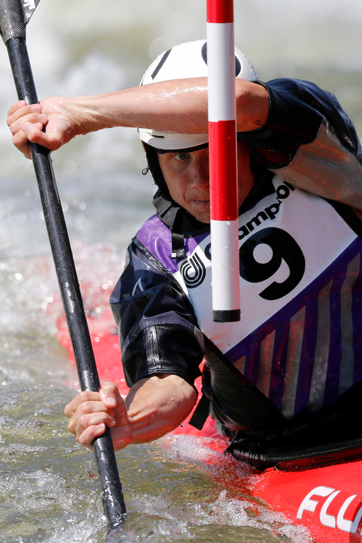Staff photo by C.B. Schmelter /
Lucien Scott eyes an upstream gate during the slalom event during the Ocoee River Championships on the 1996 Olympic Section of the Ocoee River on Friday, Aug. 24, 2018 in Copperhill, Tenn.