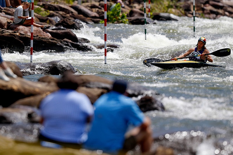 Jacob McConnell exhaustedly approaches another gate while competing in the slalom event during the Ocoee River Championships on the 1996 Olympic Section of the Ocoee River on Friday, Aug. 24, 2018 in Copperhill, Tenn.