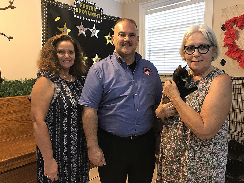From left are 4 Paws Pantry co-founder Sandi Smith, Chattanooga Humane Educational Society Executive Director Bob Citrullo and pantry co-founder Betty Crawford.
