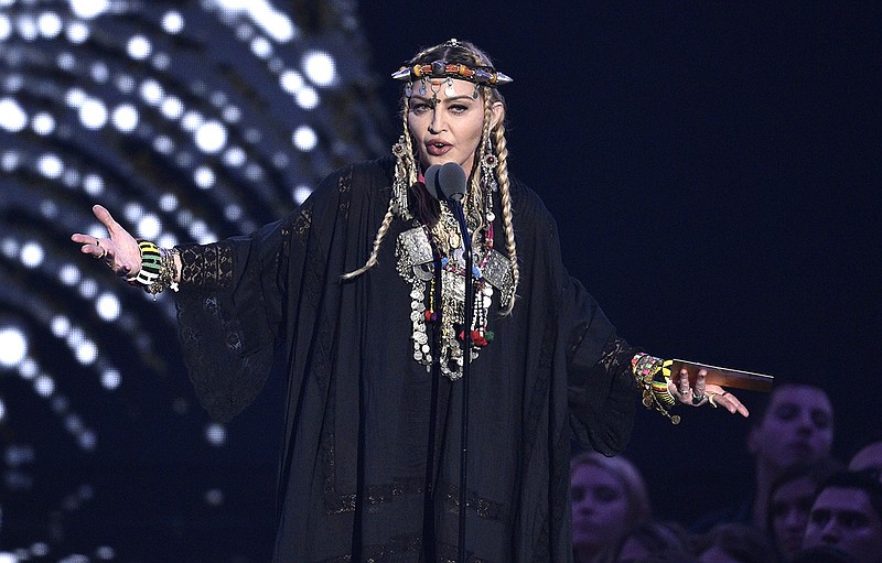 Madonna presents a tribute to Aretha Franklin at the MTV Video Music Awards at Radio City Music Hall on Monday in New York. (Photo by Chris Pizzello/Invision/AP)
