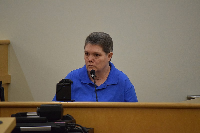 Defendant Angela Kilgore takes the stand while the jury was out of the courtroom to waive her right to testify in her murder trial in Marion County, Tenn., on Wednesday, Aug. 29, 2018.
