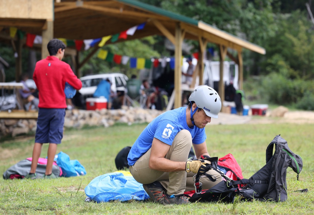Shane Parreco of Asheville, North Carolina, gets his paraglider unpacked before the Hurricane Open 2018 paragliding event Wednesday, September 5, 2018 in Whitwell, Tennessee. Parreco was working on getting his tandem instructor rating.