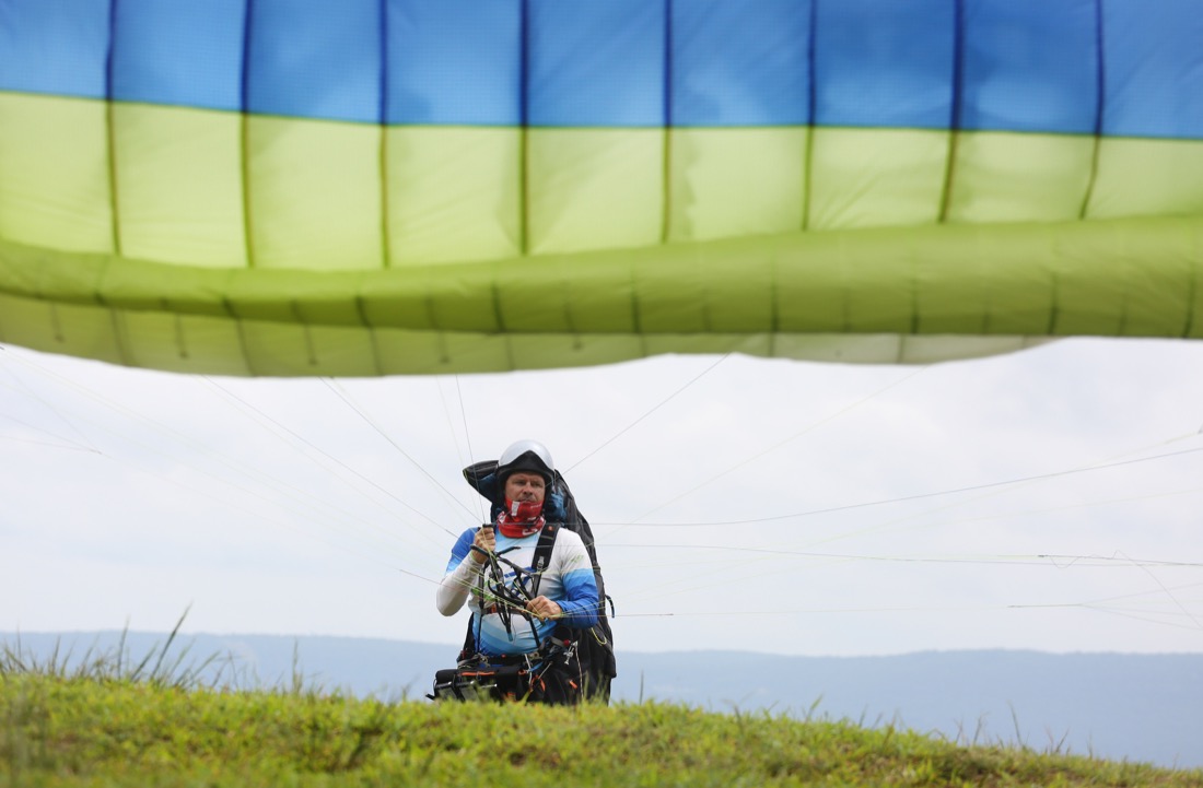 Jaro Krupa of Chicago, Illinois, does a safety check on his paraglider before the Hurricane Open 2018 paragliding event Wednesday, September 5, 2018 in Whitwell, Tennessee. Krupa has been paragliding for 29 years.