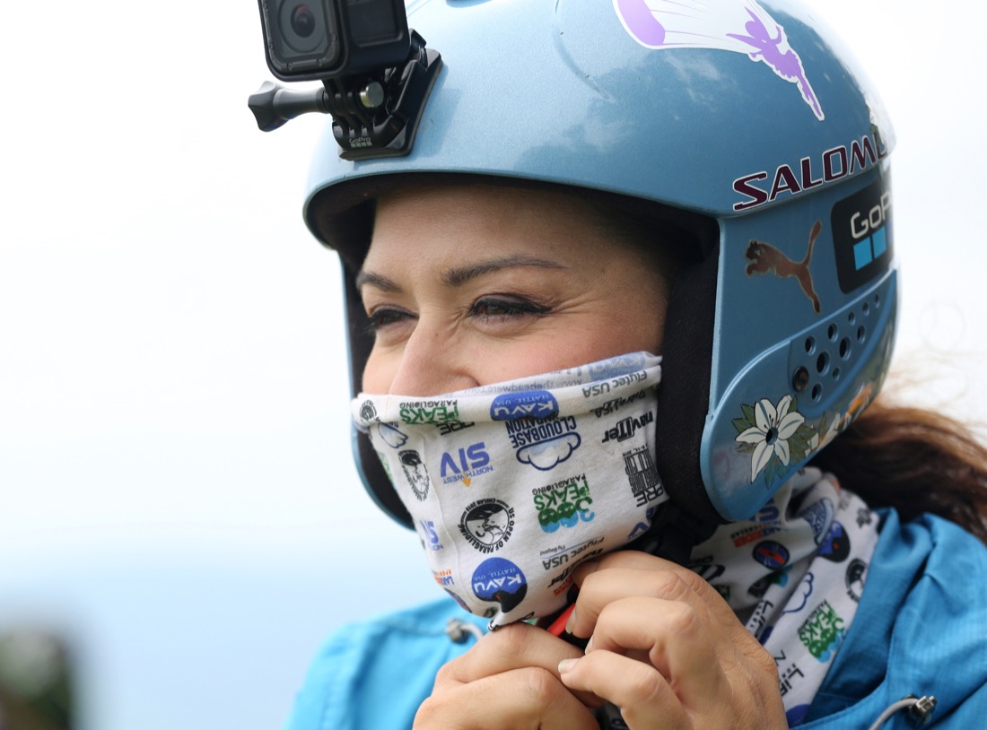 Andria Lea of Carlisle, Pennsylvania, gets her head gear ready before the Hurricane Open 2018 paragliding event Wednesday, September 5, 2018 in Whitwell, Tennessee. Lea was the only female competitor participating in the event.