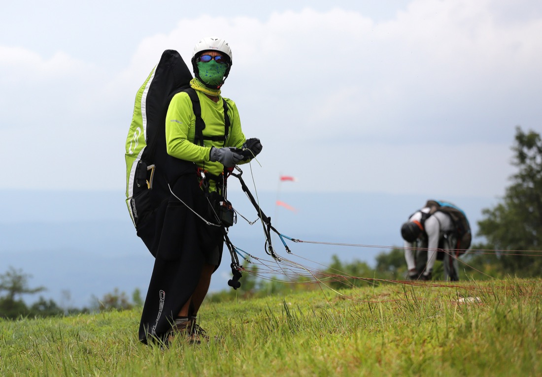Rick Jacob, paragliding land owner, looks off into the distance where others were paragliding before the Hurricane Open 2018 paragliding event began Wednesday, September 5, 2018 in Whitwell, Tennessee. Jacob helped organize the event.