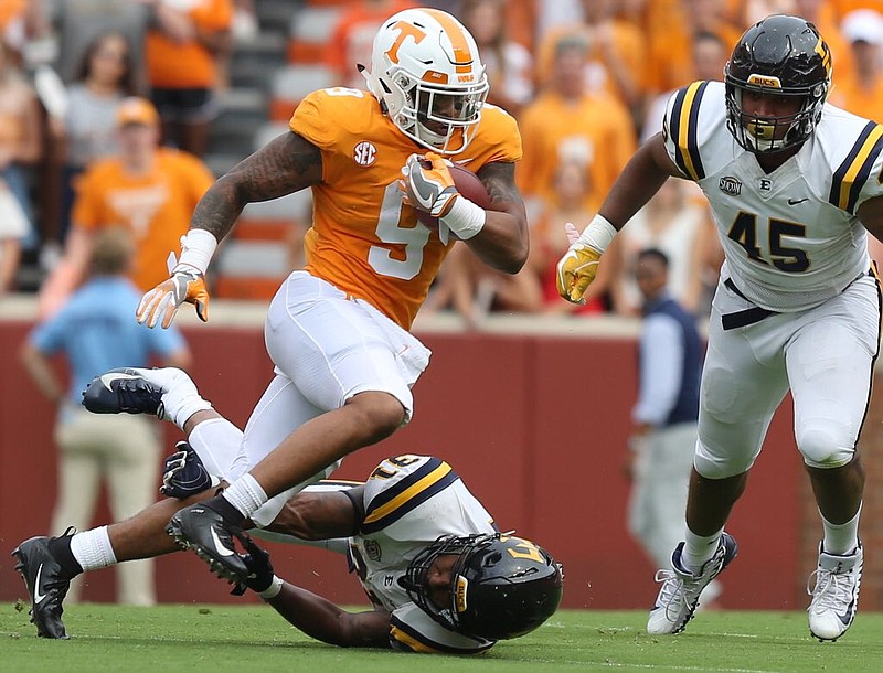 Tennessee running back Tim Jordan carries the football during the Volunteers' 59-3 win over ETSU on Saturday. Jordan finished with 49 yards on 13 carries.