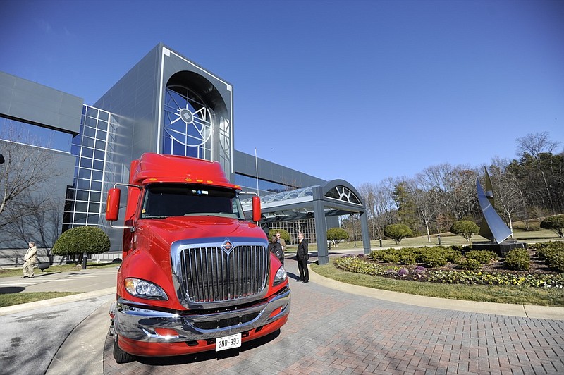 A truck sits parked outside of the U.S. Xpress Enterprises building in Chattanooga, Tenn., in this 2011 staff file photo.