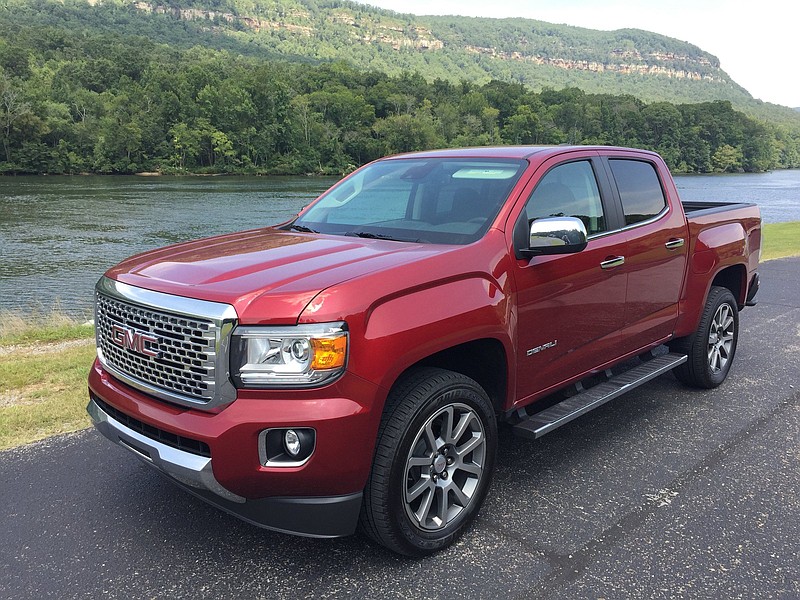 The 2018 GMC Canyon Crew Cab is shown in Denali trim.



