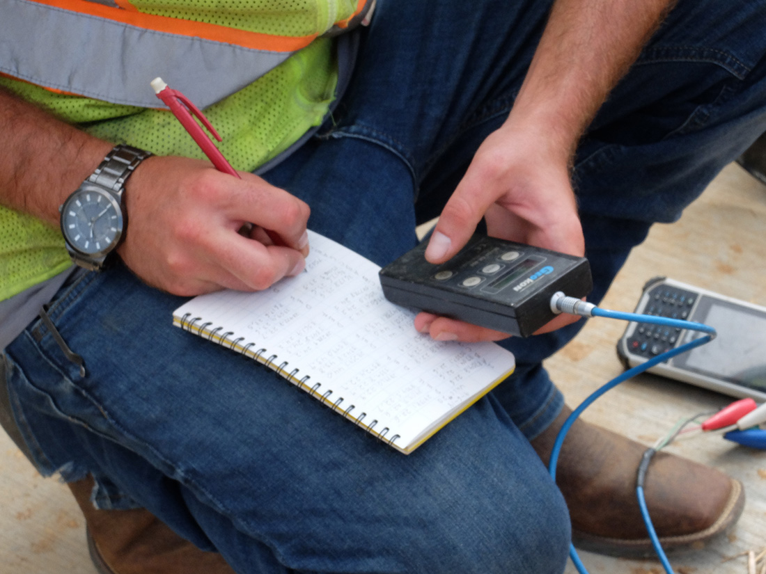 Grady Stageberg, construction engineer inspector for Volkert Inc., records inclinometer readings from a 68-foot vertical core shaft high above the U.S. Highway 27 retaining wall in view of the 4th Street interchange. The Sept. 6, 2018 reading was a weekly test at this point in the project, according to Stageberg.