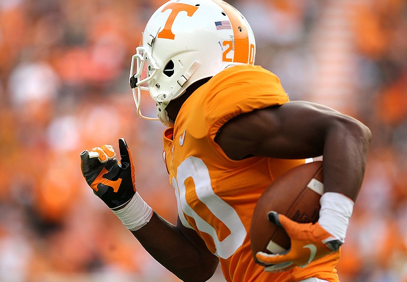 University of Tennessee defensive back Bryce Thompson (20) runs the ball after intercepting a deflected pass during the first half of the UT vs. ETSU football game at Neyland Stadium Saturday, September 8, 2018 in Knoxville, Tennessee.