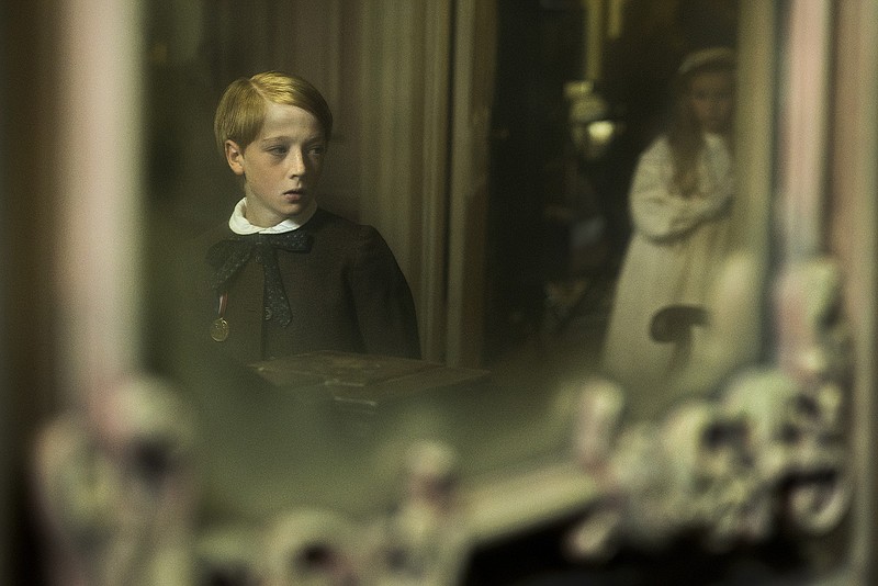 This image released by Focus Features shows Oliver Zetterstrom in a scene from "The Little Stranger." (Nicola Dove/Focus Features via AP)