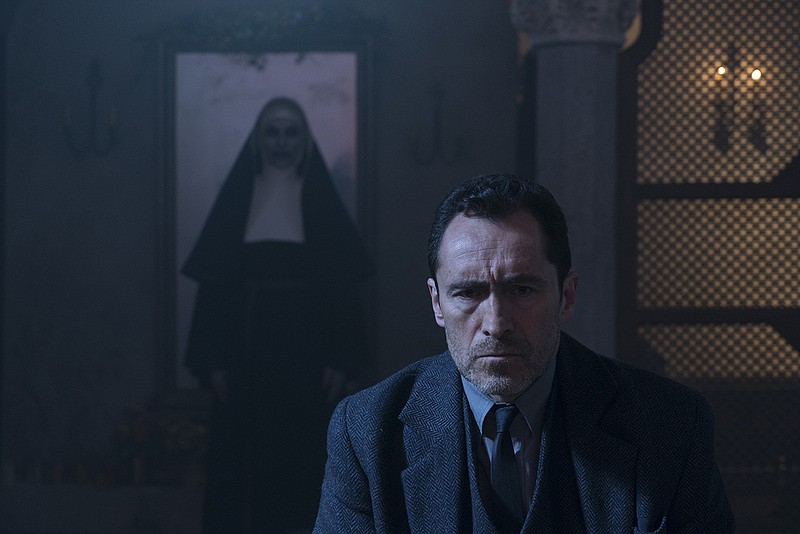 This image released by Warner Bros. Pictures shows Demian Bichir in a scene from "The Nun." (Cos Aelenei/Warner Bros. Pictures via AP)