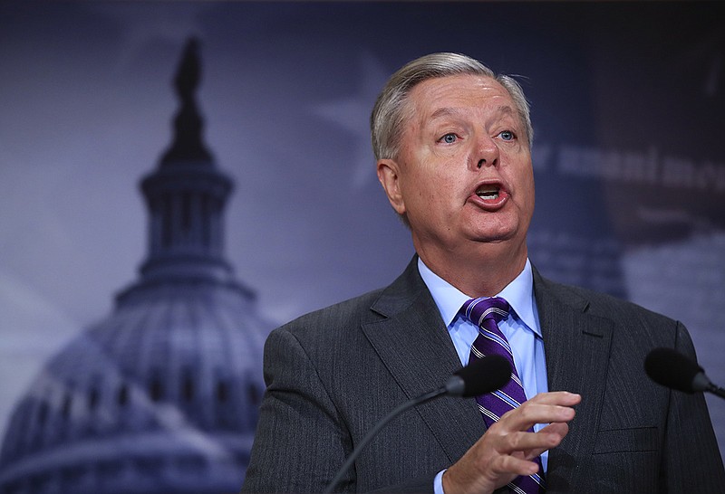 In this Nov. 1, 2017 file photo, Sen. Lindsey Graham, R-S.C., speaks on Capitol Hill in Washington. Graham's shift from Never Trump to Team Trump has confused colleagues and caused double-takes across Washington. (AP Photo/Manuel Balce Ceneta)