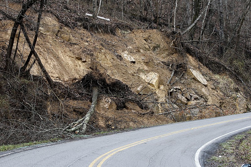 A mudslide along the shoulder of Nick-A-Jack Road in Walker County, Ga., leading up Lookout Mountain is seen Wednesday, March 11, 2015. The road has been closed until the slide can be evaluated for repairs.