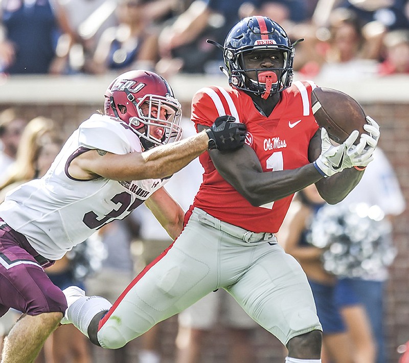 Ole Miss wide receiver A.J. Brown scores on a 37-yard touchdown catch with Southern Illinois safety Michael Elbert covering him during last week's game in Oxford, Miss.