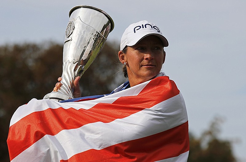 LPGA Tour golfer Angela Stanford celebrates Sunday after winning the Evian Championship in France for her first major championship.