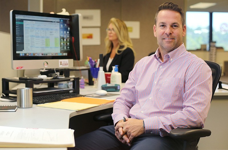 Staff photo by Erin O. Smith / 
Carson Combs, the managing director of Brickhunter, poses for a photo Wednesday, September 12, 2018 at Brickhunter in Chattanooga, Tennessee. Brickhunter has received new funding to grow its business of matching consumer and sellers of brick and other building materials.