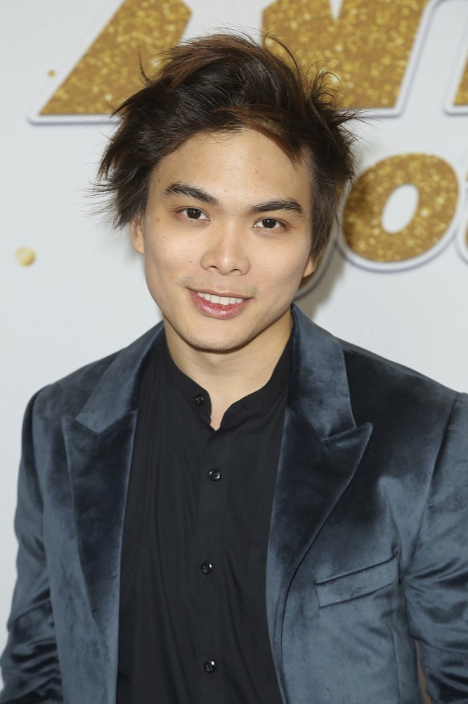 Shin Lim arrives at the "America's Got Talent" Season 13 Finale Show red carpet at the Dolby Theatre on Tuesday, Sept. 18, 2018, in Los Angeles. (Photo by Willy Sanjuan/Invision/AP)

