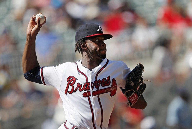 The Atlanta Braves' Touki Toussaint pitches in the first inning of Wednesday's home game against the St. Louis Cardinals. The Braves won 7-3.