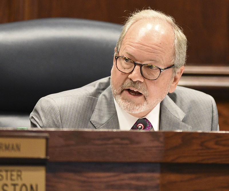 District 8 Commissioner Tim Boyd asks a question of County Mayor Jim Coppinger during a meeting in the Hamilton County Courthouse on Aug. 29, 2017.