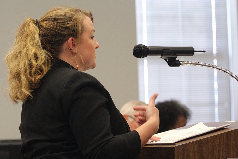 Meghan Phillips speaks about the school bus contract Hamilton County Schools currently holds during a school board meeting Thursday, September 20, 2018, at the Hamilton County Department of Education in Chattanooga, Tennessee. Phillips said her child has been dropped off more than a mile from her residence in the past and has heard of a variety of other issues with the company, and she was hoping to encourage the school board to work with a different company.