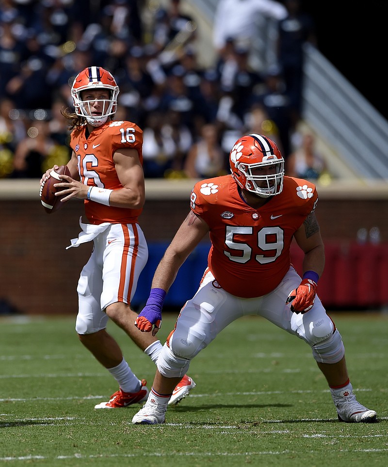 Clemson quarterback Trevor Lawrence drops back to pass as Gage Cervenka during last week's home win against Georgia Southern.