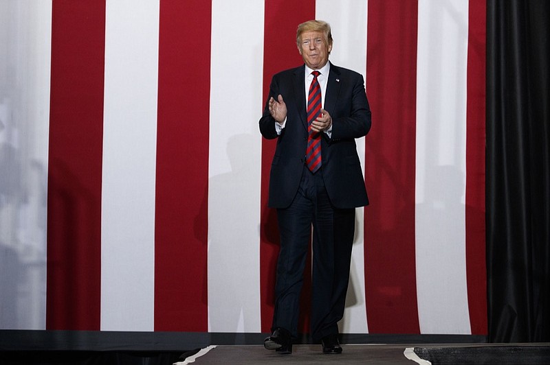 President Donald Trump arrives to speak during a campaign rally, Friday, Sept. 21, 2018, in Springfield, Mo. (AP Photo/Evan Vucci)

