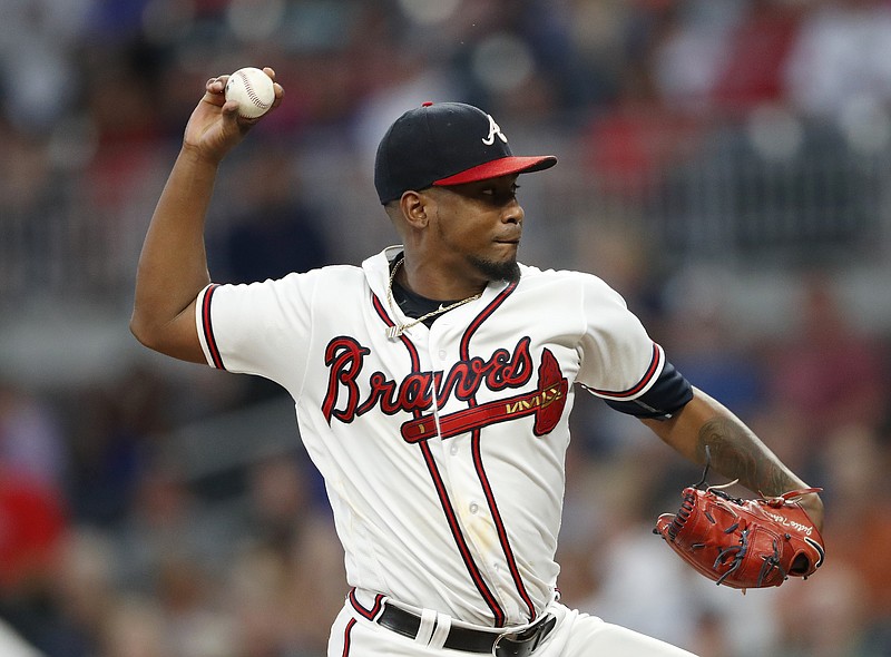 Atlanta Braves starter Julio Teheran pitches during the first inning of Friday's home game against the Philadelphia Phillies. The Braves won 6-5 and can clinch the NL East division title with a win against the Phillies today.