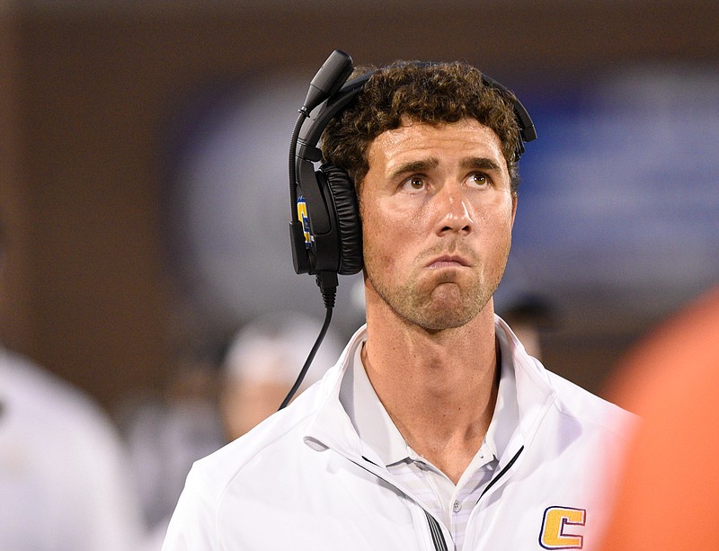 UTC head football coach Tom Arth looks up at the scoreboard during the Mocs' home football game against the Samford Bulldogs at Finley Stadium on Saturday, Sept. 22, 2018, in Chattanooga, Tenn. 