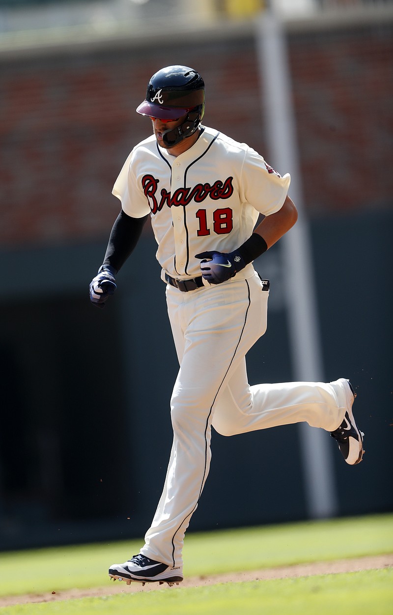 The Atlanta Braves' Lane Adams rounds the bases after hitting a solo home run in the fifth inning of Sunday's 2-1 home win against the Philadelphia Phillies.