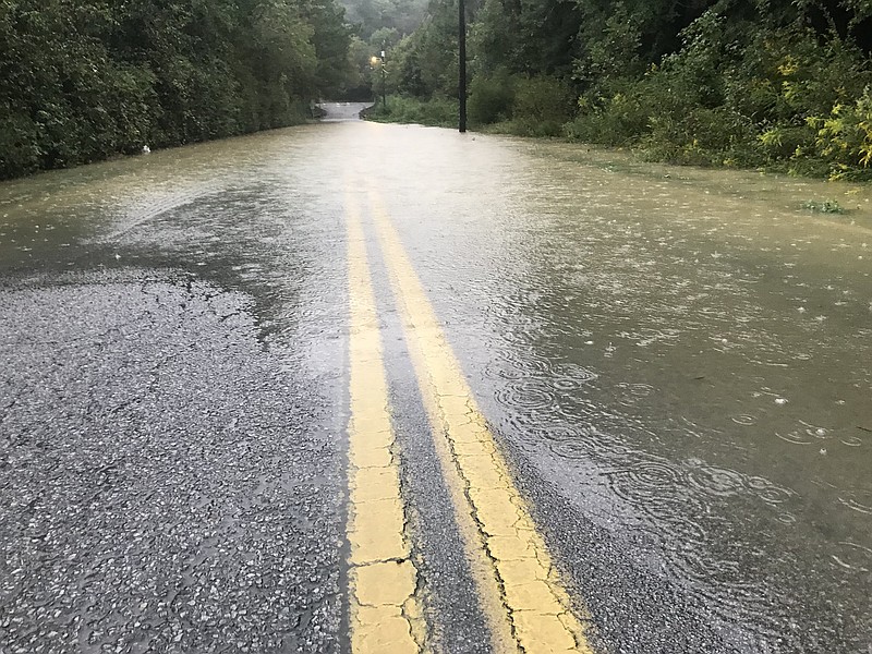 High water from recent rains covers Davidson Road in East Brainerd on Monday, Sept. 24, 2018. / Staff photo by Robin Rudd