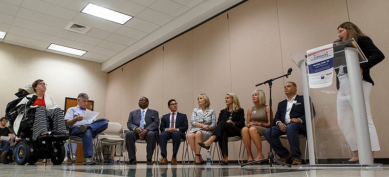 Assistant political science professor Amanda Wintersieck, right, introduces the format for state House candidates to introduce themselves during a meet and greet hosted by the League of Women Voters in the Chattanooga Rooms at the University Center on the campus of the University of Tennessee at Chattanooga on Monday, Sept. 24, 2018 in Chattanooga, Tenn.