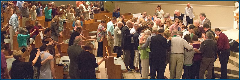 Attendees gather and pray over one another during the 2017 My Hope Conference at Hixson First Baptist Church.