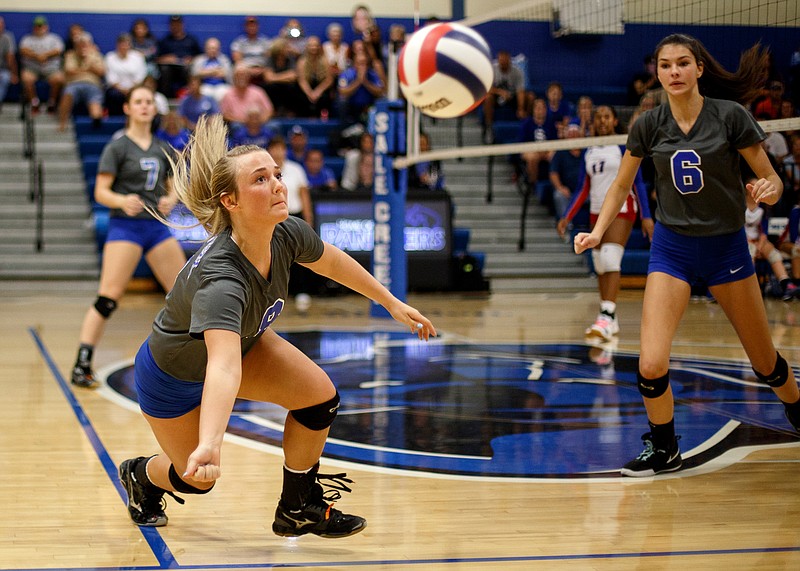 Sale Creek's Jayda Perry (8) lunges for a ball versus Red Bank at Sale Creek's McEwen Gym on Tuesday, Sept. 25, 2018 in Sale Creek, Tenn.